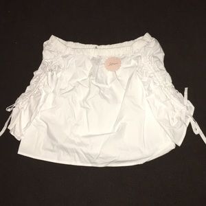 A white over the shoulder top.